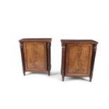 A PAIR OF WILLIAM IV MAHOGANY PEDESTAL CABINETS, with plain top above a fielded cupboard door,