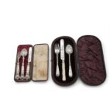 TWO VICTORIAN SILVER CHRISTENING SETS, comprising a cased three piece set, Sheffield 1890 and