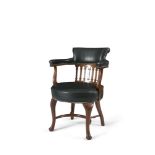 AN EDWARDIAN MAHOGANY FRAMED AND GREEN LEATHER UPHOLSTERED DESK CHAIR, with padded crest rail and