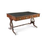 A REGENCY STYLE MAHOGANY WRITING TABLE, the rectangular top inset with green leather, and with