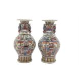 A PAIR OF CHINESE EXPORT BALUSTER VASES, mid 19th century, each with fold-over rim and waisted