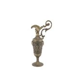 A 20TH CENTURY ITALIAN PEWTER CLARET JUG, decorated in the Renaissance taste with human masks,