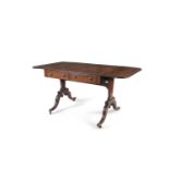 A REGENCY STYLE MAHOGANY AND CROSS BANDED SOFA TABLE, with double drop leaves, the frieze fitted