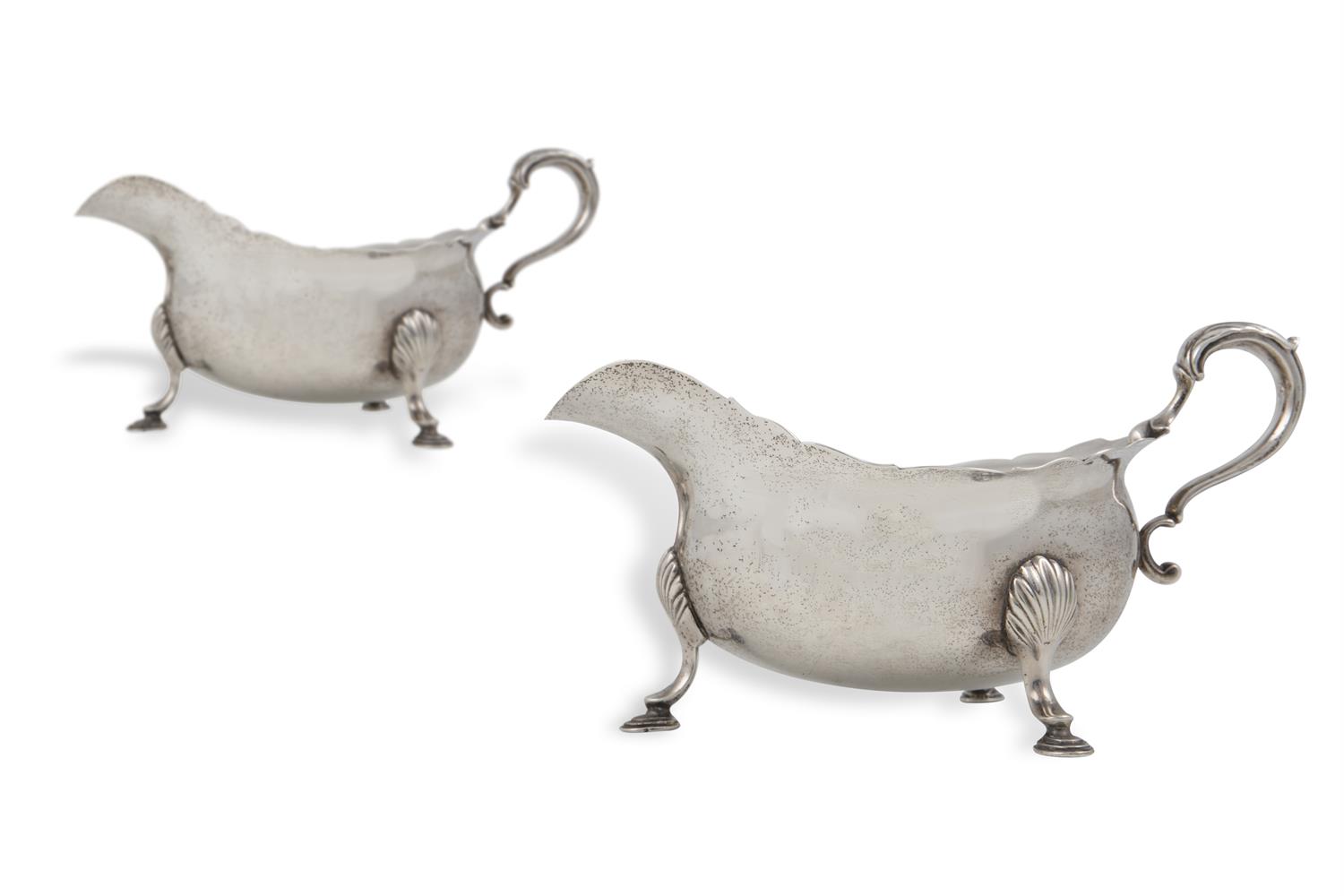 A PAIR OF LARGE IRISH GEORGE III SILVER SAUCE BOATS, Dublin 1798, mark of Robert Breading, each of