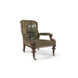 A LARGE VICTORIAN MAHOGANY FRAMED AND GREEN HIDE UPHOLSTERED LIBRARY ARMCHAIR, with button back