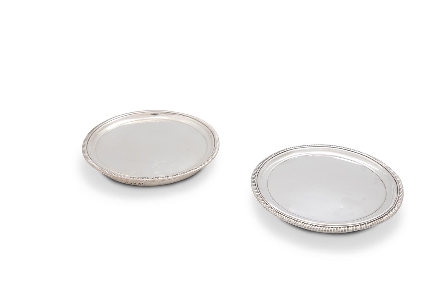 A PAIR OF LATE GEORGE III CIRCULAR WAITERS/COASTERS, London 1808, each with gadrooned rim, on