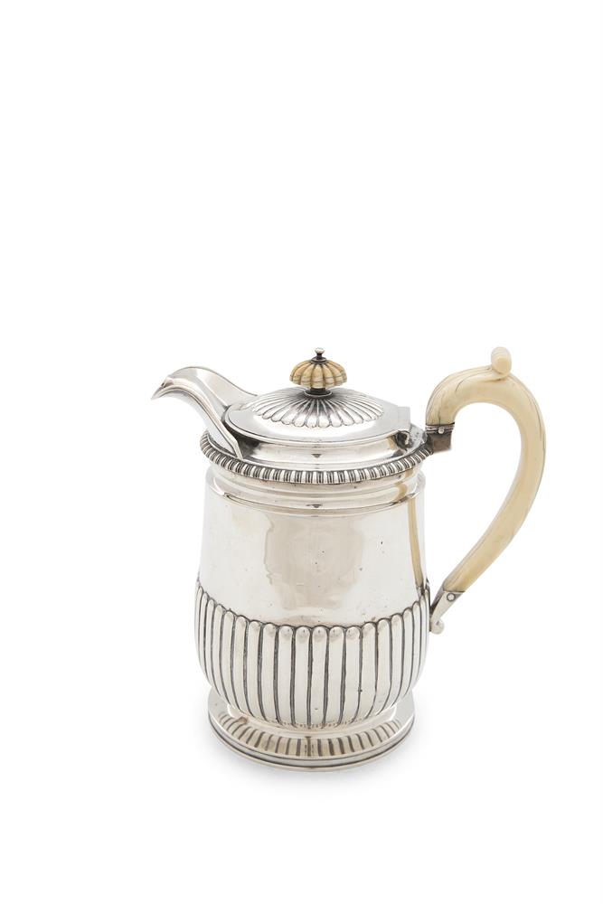 A LATE GEORGE III SILVER HOT WATER POT, London 1812, mark of J.W. Story & W. Elliot. of slightly