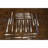 A SET OF TWELVE VICTORIAN SILVER PLATED FRUIT KNIVES AND TWELVE FORKS, with mother of pearl handles