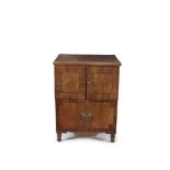 A GEORGE III MAHOGANY AND EBON STRUNG CONVERTED COMMODE, with twin cupboard doors above a single