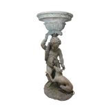 A BRONZE FIGURAL GARDEN CENTREPIECE, modelled in the form of a standing cherub holding aloft a