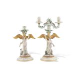 A PAIR OF MEISSEN PORCELAIN FIGURAL CANDELABRA, 19th century, modelled as Ganymede and Hebe, each