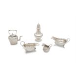 A COLLECTION OF SILVER ITEMS, comprising:- a small plain silver sauce boat, London 1924, maker's