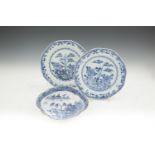 A PAIR OF CHINESE 'SILVER SHAPED' BLUE AND WHITE DISHES, Quinlong Period (1736 - 95). 22cm diameter;