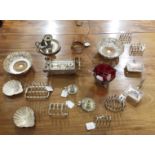 A COLLECTION OF SILVER PLATE, comprising:- A pair of silver plated wine coasters, with wooden bases-