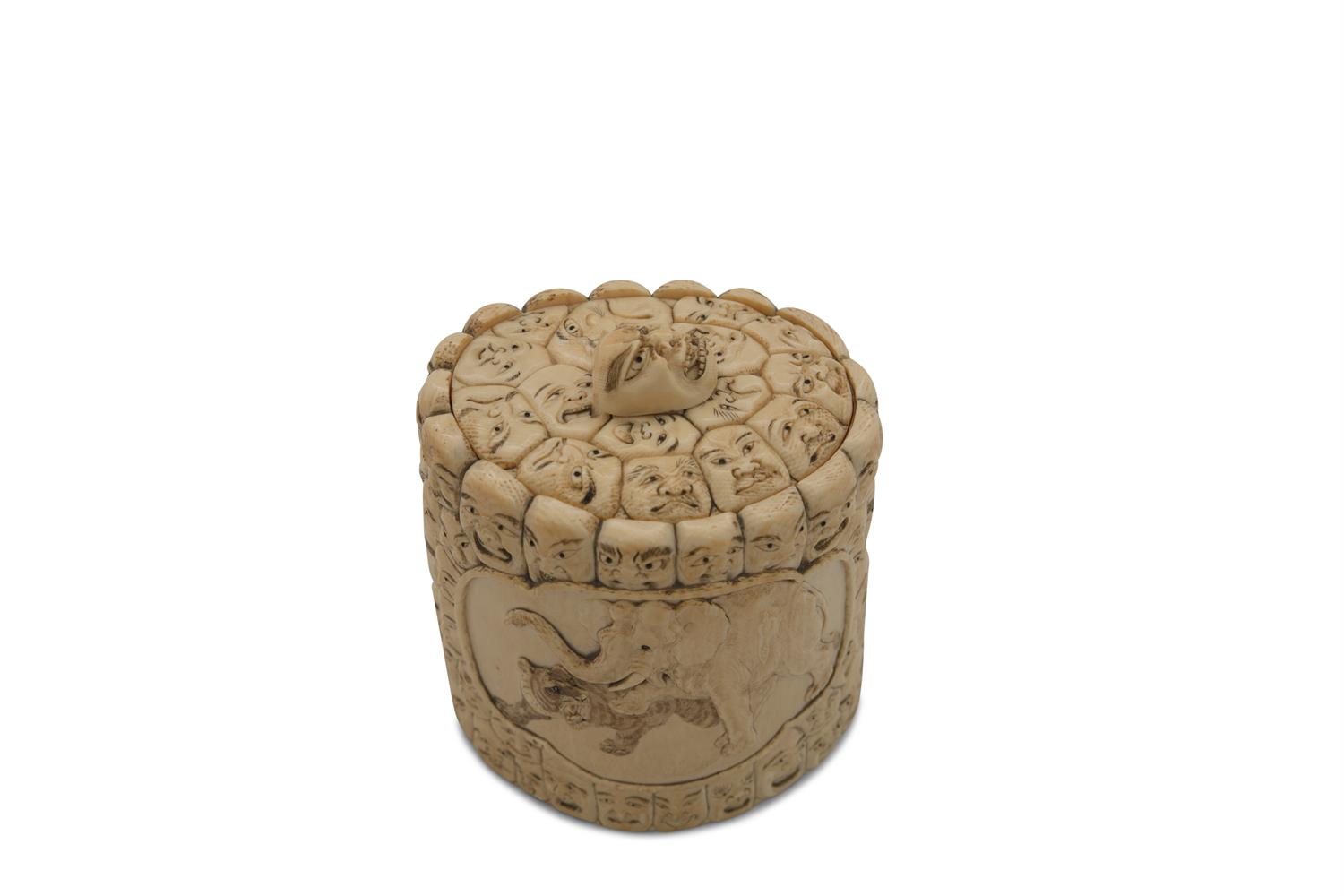 ***PLEASE NOTE: THIS LOT CONTAINS IVORY***A JAPANESE CARVED IVORY BOX AND COVER, 19th century, of
