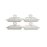 A SET OF FOUR SHEFFIELD PLATED ENTRÉE DISHES AND COVERS, each of rectangular form, with gadrooned