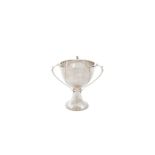 A SILVER THREE HANDLED PRESENTATION CUP, Birmingham 1926, mark of Henry Moreton, of plain ovoid