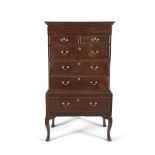A GEORGE III MAHOGANY TALLBOY CHEST ON STAND, with moulded cornice above a plain drawer frieze and