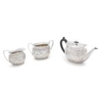 A VICTORIAN SILVER THREE PIECE TEA SERVICE, London 1894, mark of West & Son, comprising teapot,