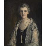 Sir John Lavery RA RSA RHA (1856-1941)Mrs. J.F. McGuire - a Half Length Portrait Wearing a Black