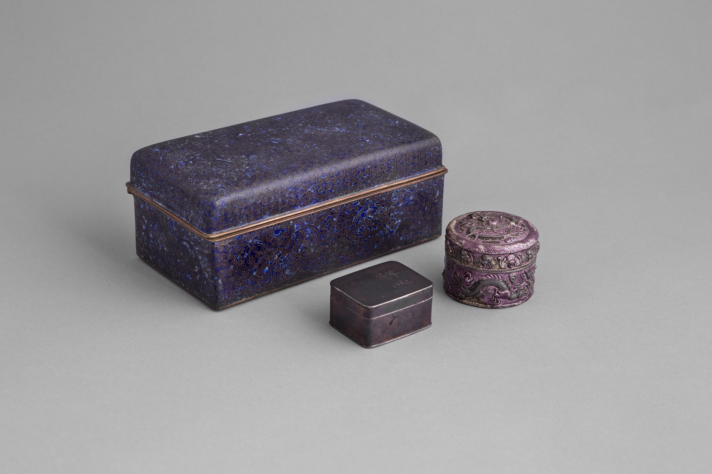 A CLOISSONÉ BOX, a small Chinese silver and enamel circular box, and a small Japanese bronze seal