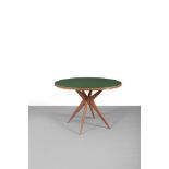 DINING TABLE A 1950s circular dining table, Italy