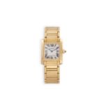 A LADY'S 18K GOLD 'TANK FRANCAISE' BRACELET WATCH, BY CARTIERThe 4-jewel quartz movement, cream dial