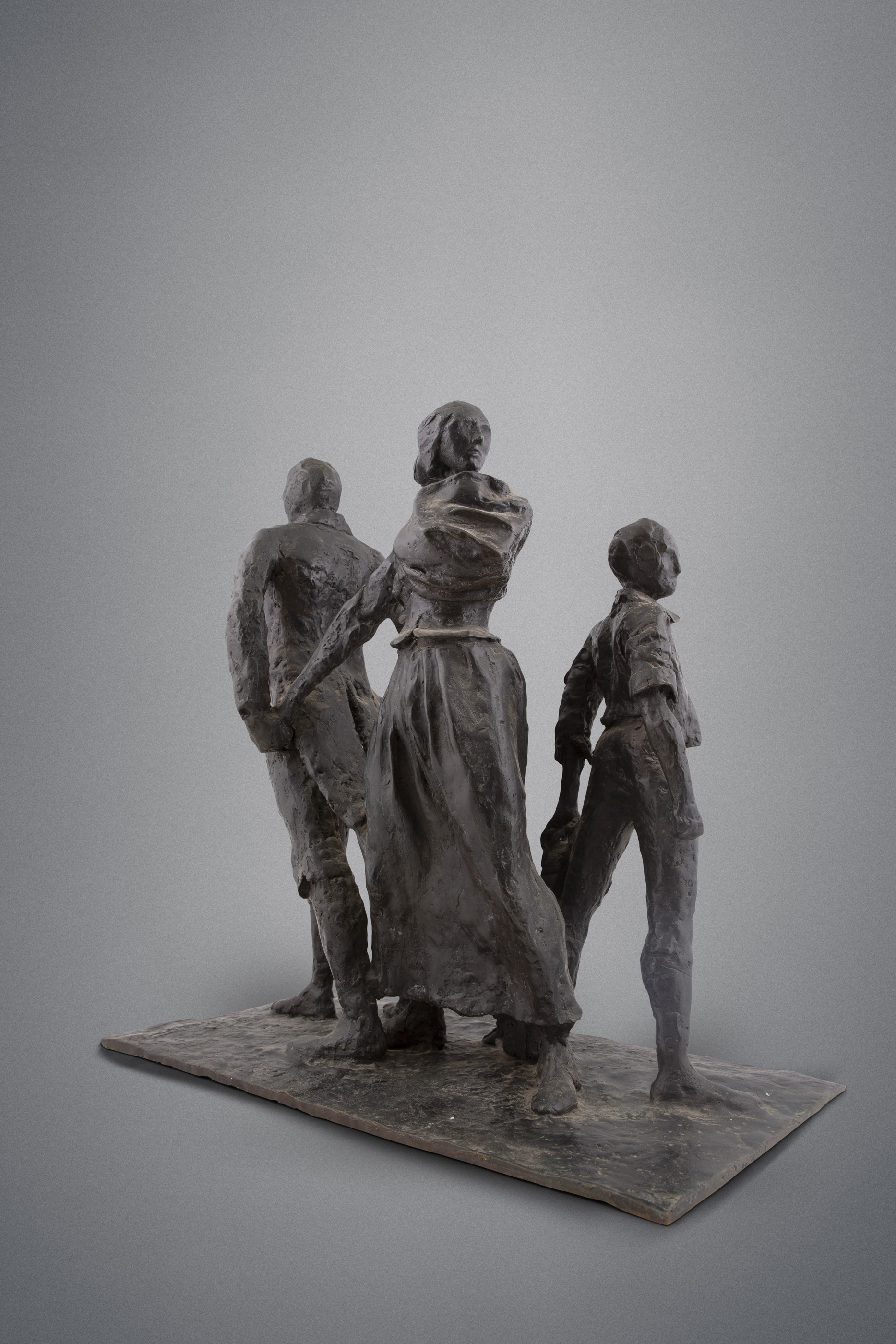 Eamonn O'Doherty (1939-2011)The Emigrants (1990)Bronze, 49cm high x 49cm long x 26cm diameter (19¼ x - Image 2 of 2