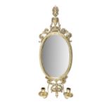 A BRASS FRAMED GIRANDOLE WALL MIRROR, in the neo-classical taste, with surmounted urn and scrolls,