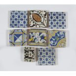 Lote de ocho azulejos de cerámica esmaltada, tres con decoración geométrica en azul, tres de