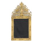Espejo en madera tallada, calada y dorada. S. XIX Medidas: 168 x 89 cm