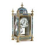 Reloj de sobremesa en bronce y esmalte cloisonné decorado con motivos orientales S. XIX Medidas: