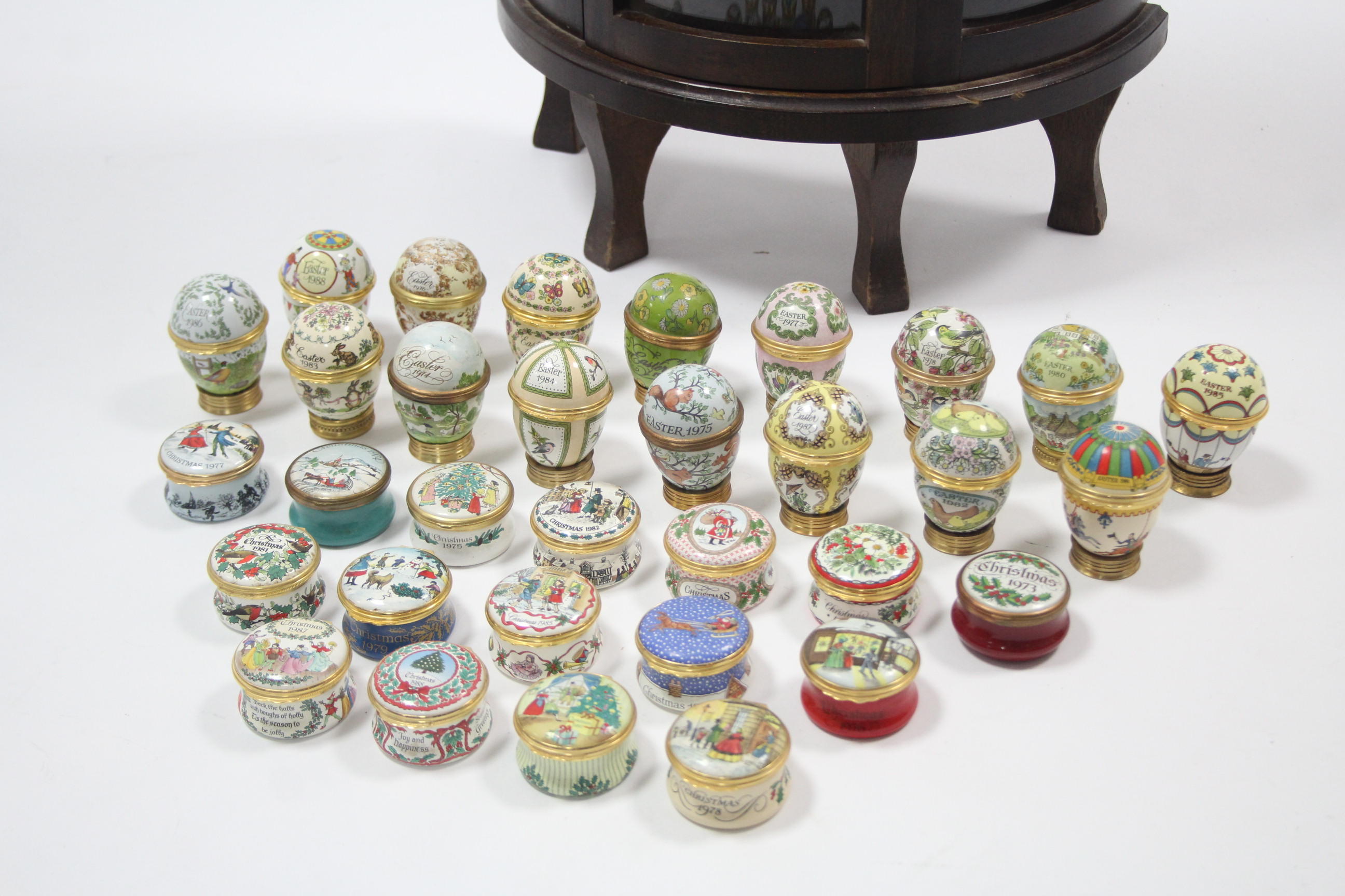 A collection of sixteen Halcyon Days enamelled Christmas boxes, & sixteen ditto egg-shaped boxes, - Image 2 of 4