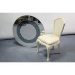 A frameless bevelled circular wall mirror, 35½” diameter; & a white painted wood occasional chair.