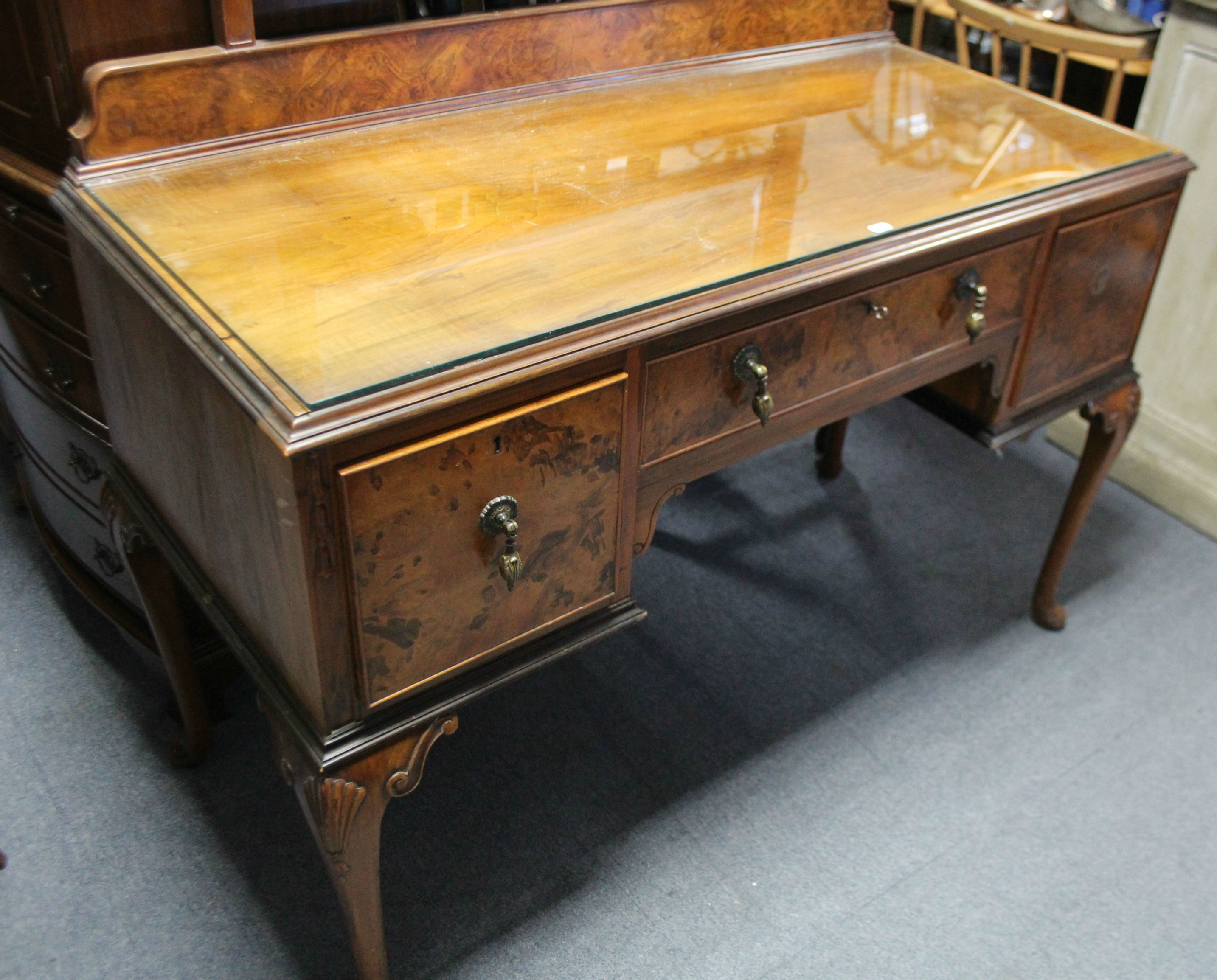 A mid-20th century burr-walnut three-piece bedroom suite comprising a twin-door wardrobe, 48” wide - Image 7 of 8