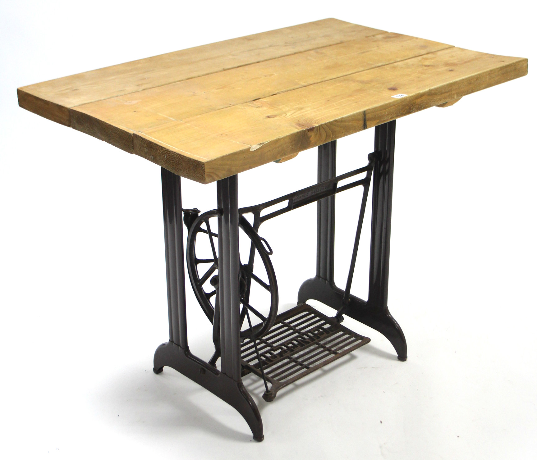 A Singer treadle sewing machine base with later pine top, 39¼” wide; together with a silvered- - Image 2 of 2