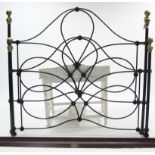 A Victorian-style black-finish iron & brass 5' bedstead, complete with side rails.