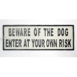 A reproduction painted cast-iron rectangular sign “Beware of the dog enter at own risk”, 14” x 5”.