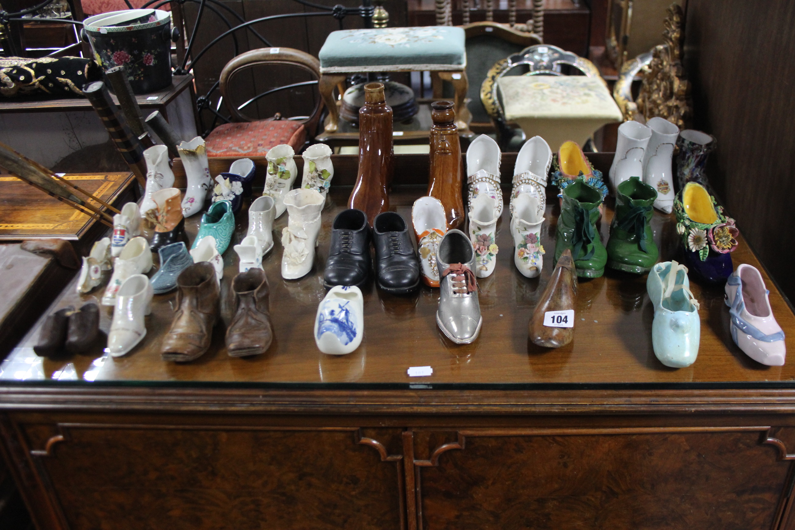 A collection of approximately forty various shoe ornaments. - Image 2 of 2