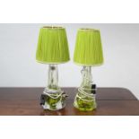A pair of green tinted glass table lamps, bases of square tapered form, with shades, 16½” high.