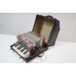 A "Universa" model Perfect Tone piano accordion, with carrying case.