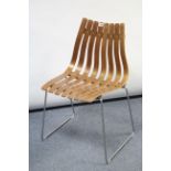 A Scandia wooden slatted occasional chair after a design by Hans Brattrund, & on silvered-metal