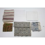 Two white silk damask tablecloths; & various other items of household textiles.