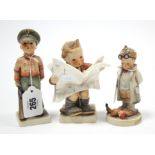 Three Goebel Hummel figures.