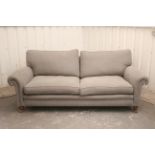 A good quality three-seater settee with loose cushions to the seat & back, upholstered pale grey