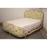 A 19th century continental-style cream painted & carved wooden frame 5’ bedstead, complete with