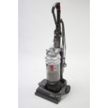 A Dyson upright vacuum cleaner, w.o.