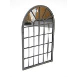 A modern wrought-metal frame rectangular wall mirror with rounded top, 23¾” x 14¼”.