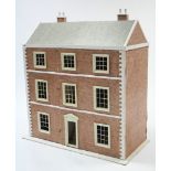 A painted wooden & paper-covered three-storey doll’s house with opening front, 30½” wide x 33½” high