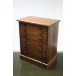 A Victorian mahogany collector’s chest fitted six long graduated drawers with turned knob